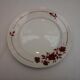 Assortiment de 18 assiettes dominante rouge