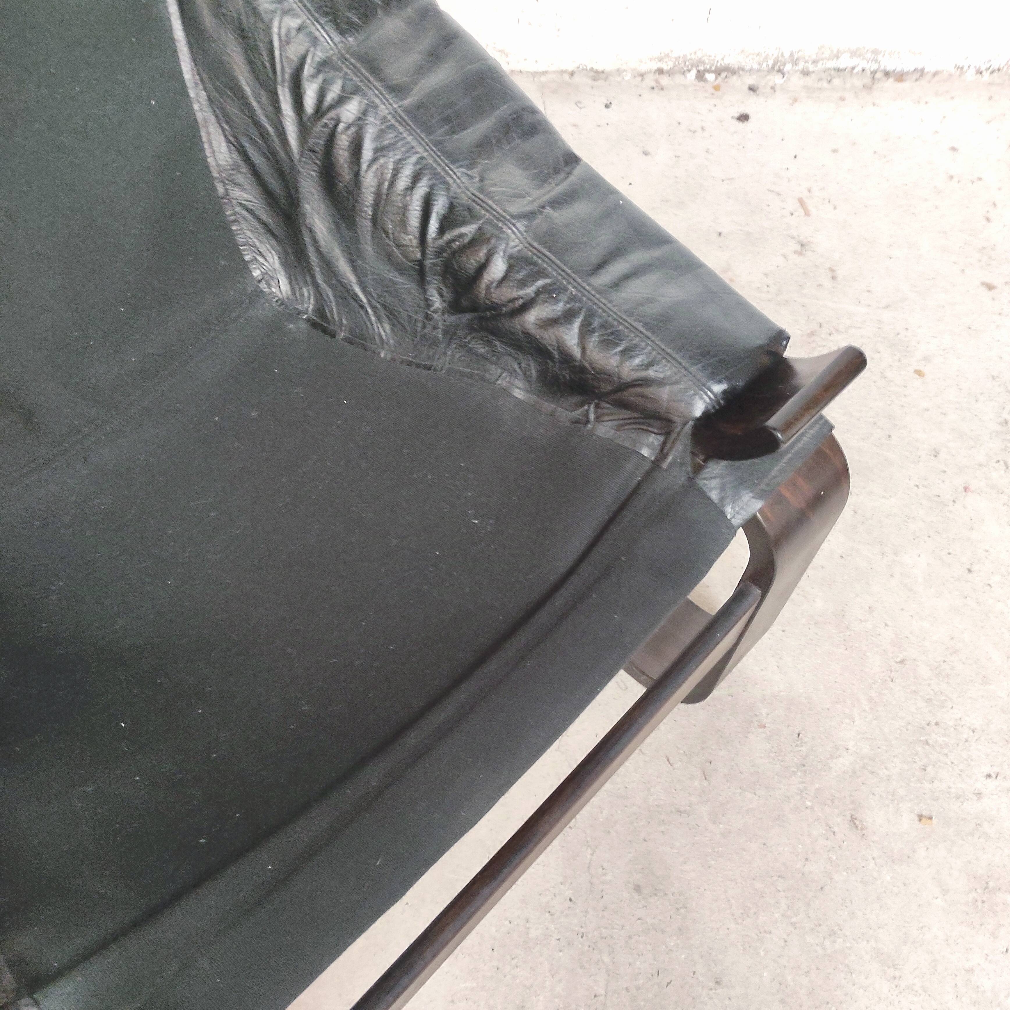 Pair of Kroken armchairs in black leather