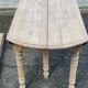 Renovated Louis Philippe round extendable dining table with 4 leaves.