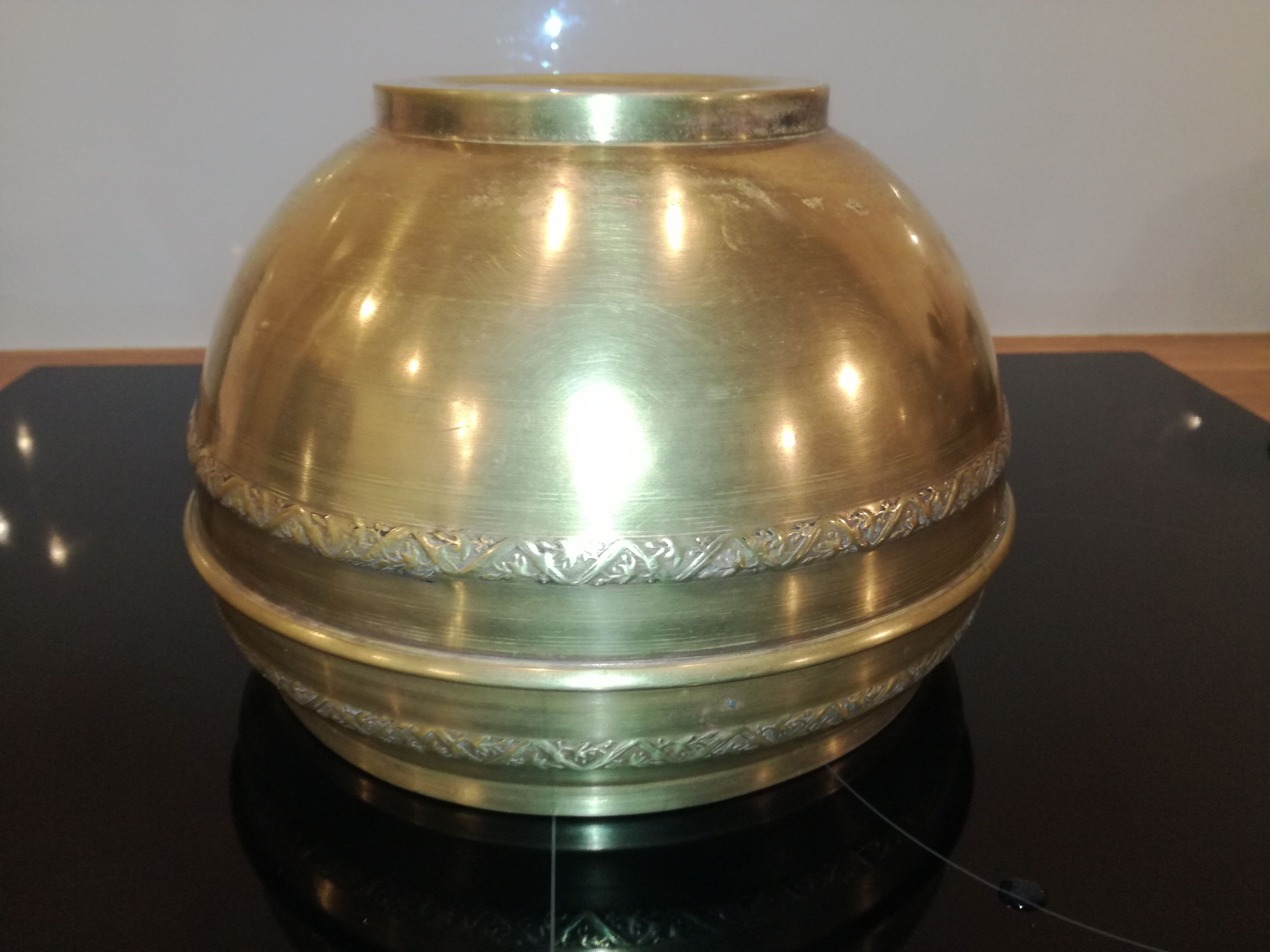 Brass pot cover