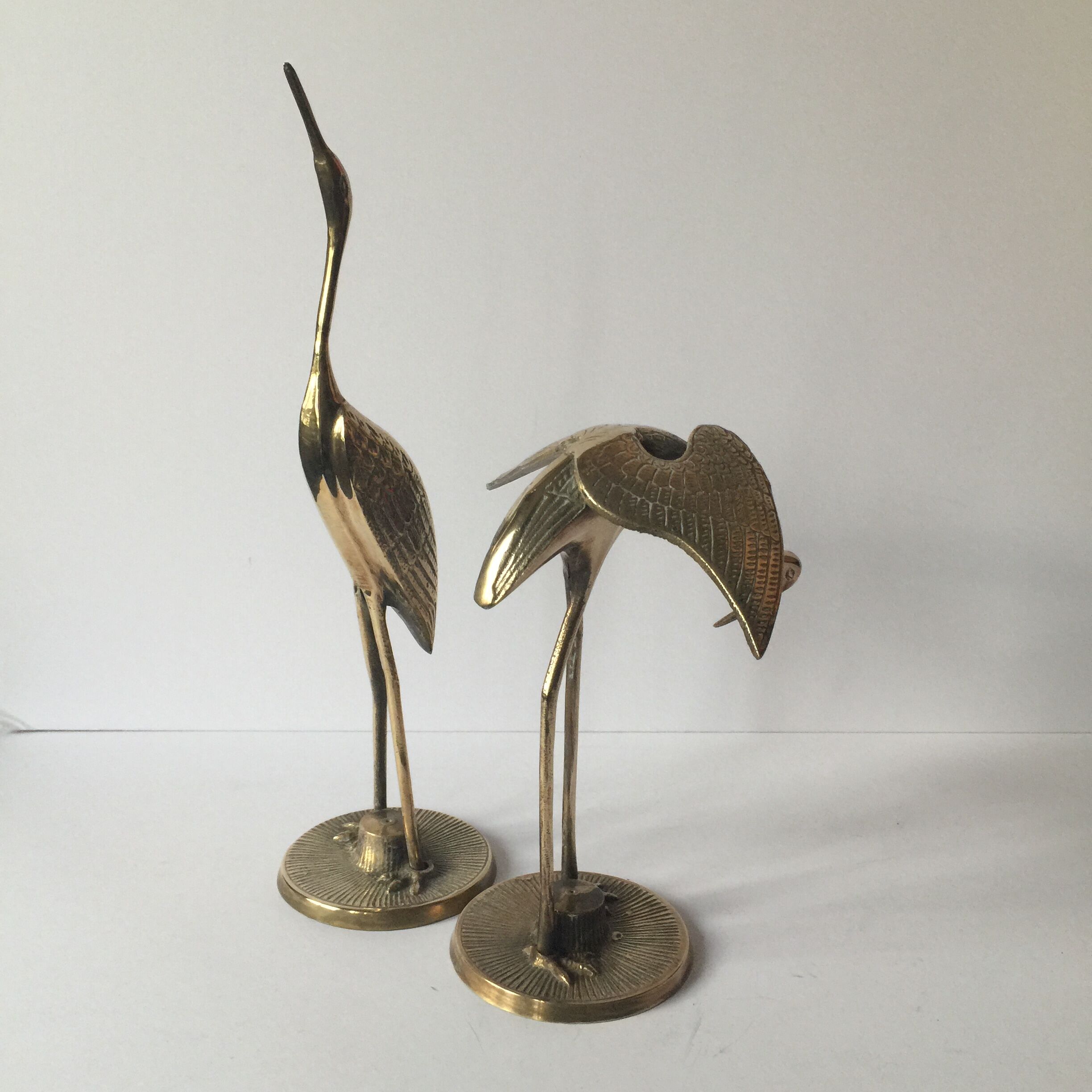 Couple of brass birds