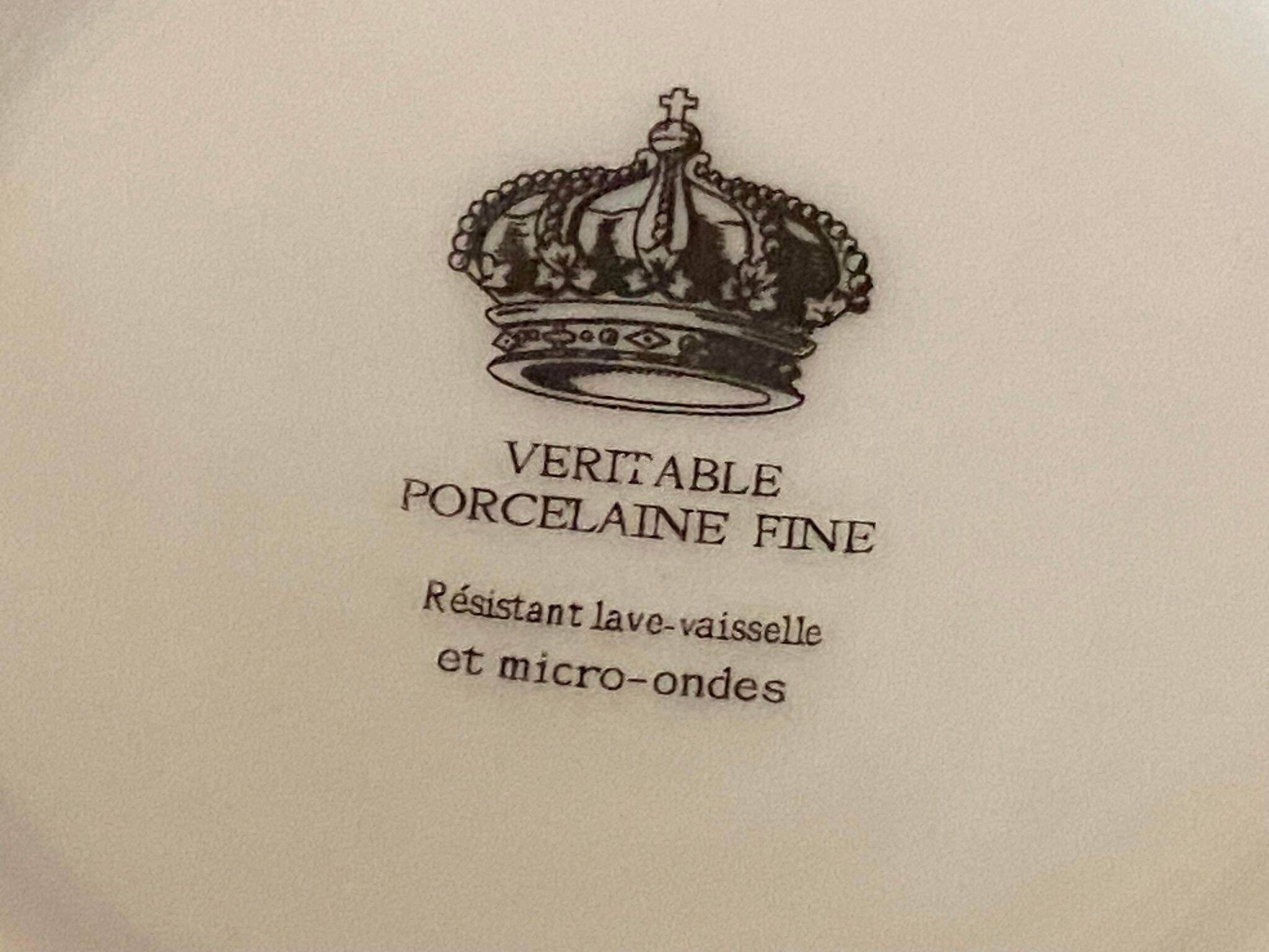 4 fine white porcelain cups with fine flower decoration