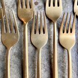 12 gilded bronze forks