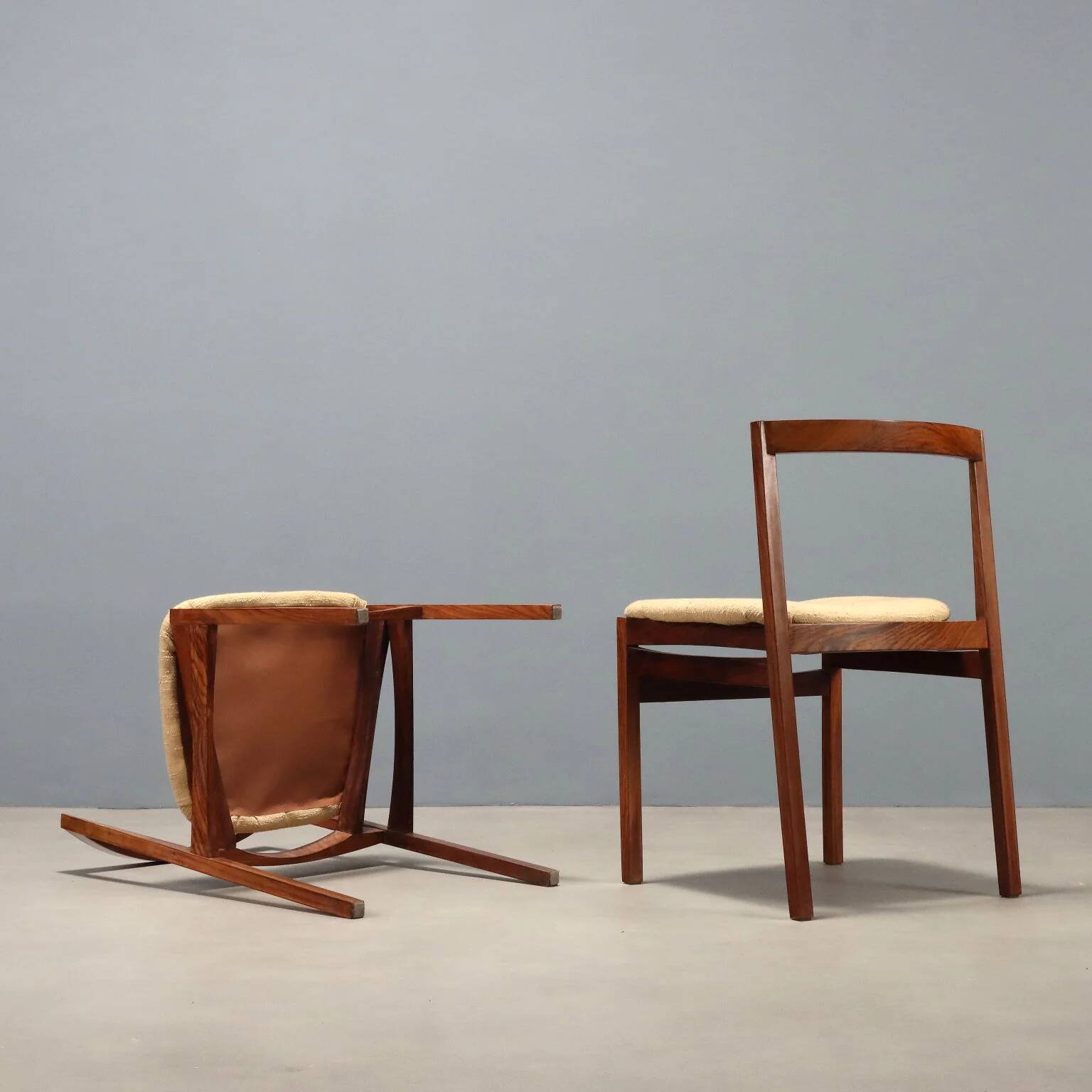 Vintage lounge chairs in exotic wood and fabric, 1960s design.