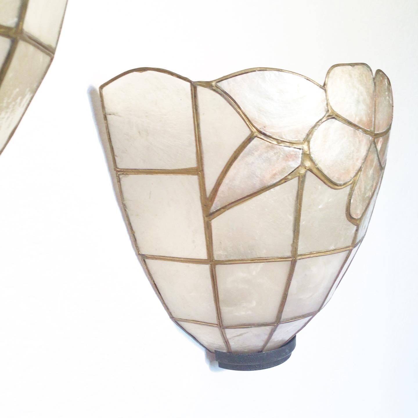 Trio of mother-of-pearl wall lamps