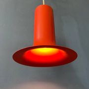 Vintage orange cone-shaped Raak suspension