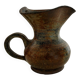 Patinated stoneware jug