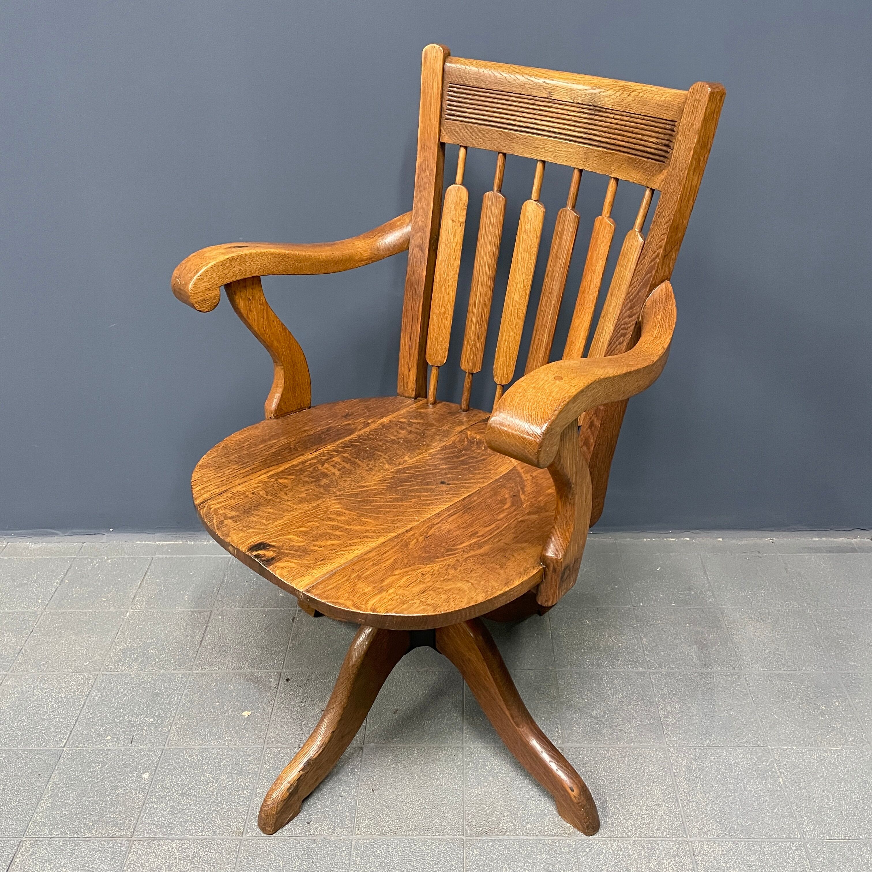 Antique American oak office chair with armrests 1920s