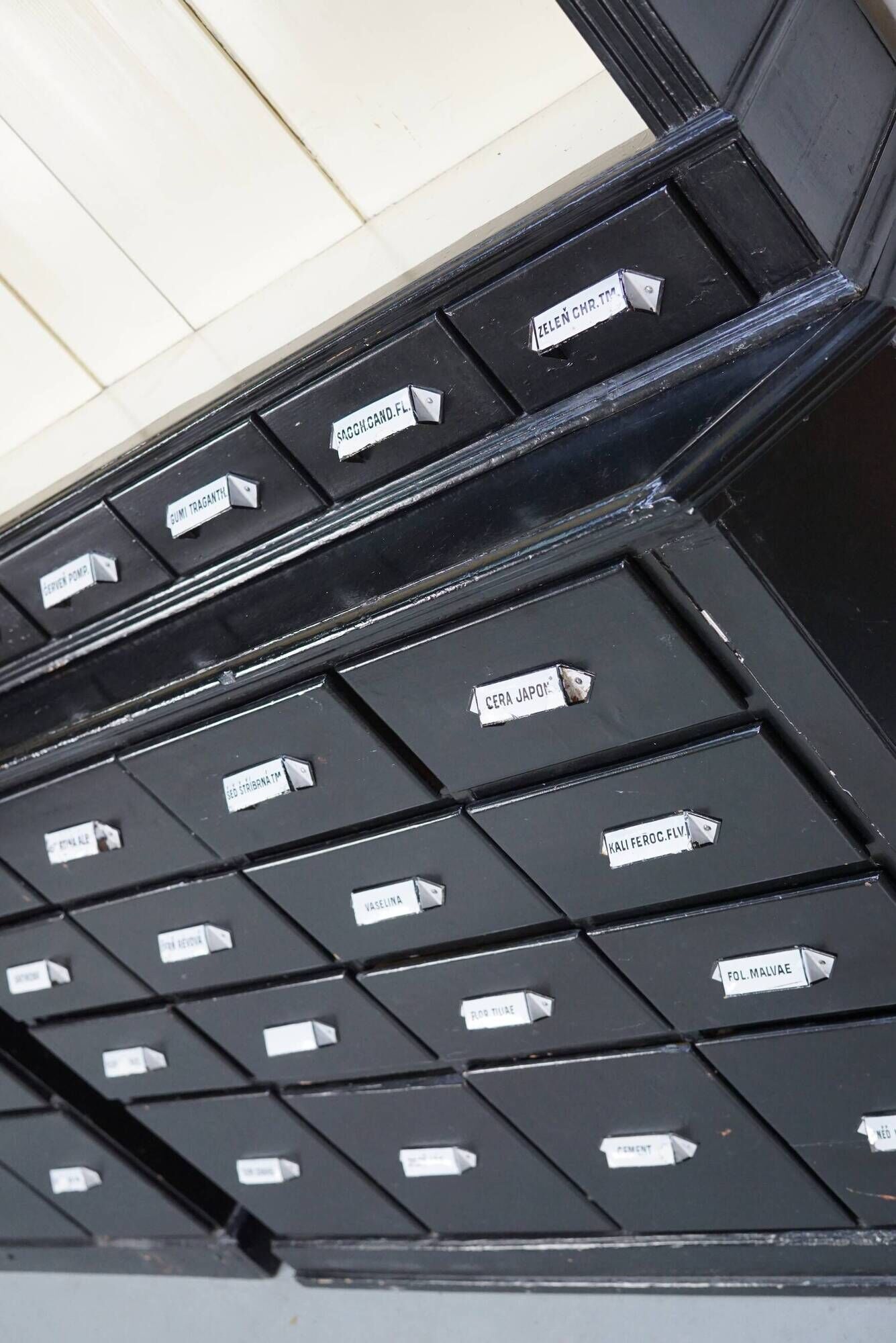 Large pair of antique apothecary cabinets painted black, Eastern Europe, 1910s