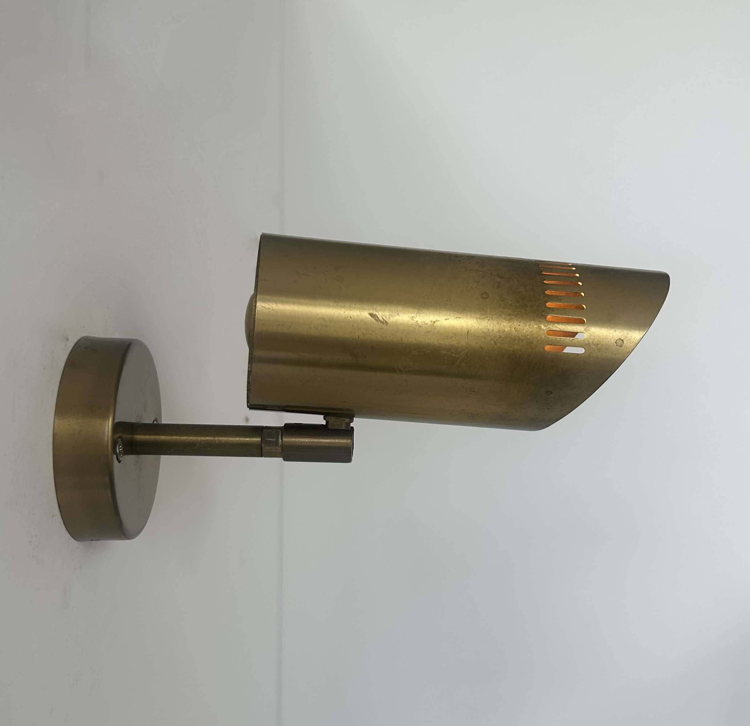 Vintage adjustable wall light, solid perforated brass, France 1960