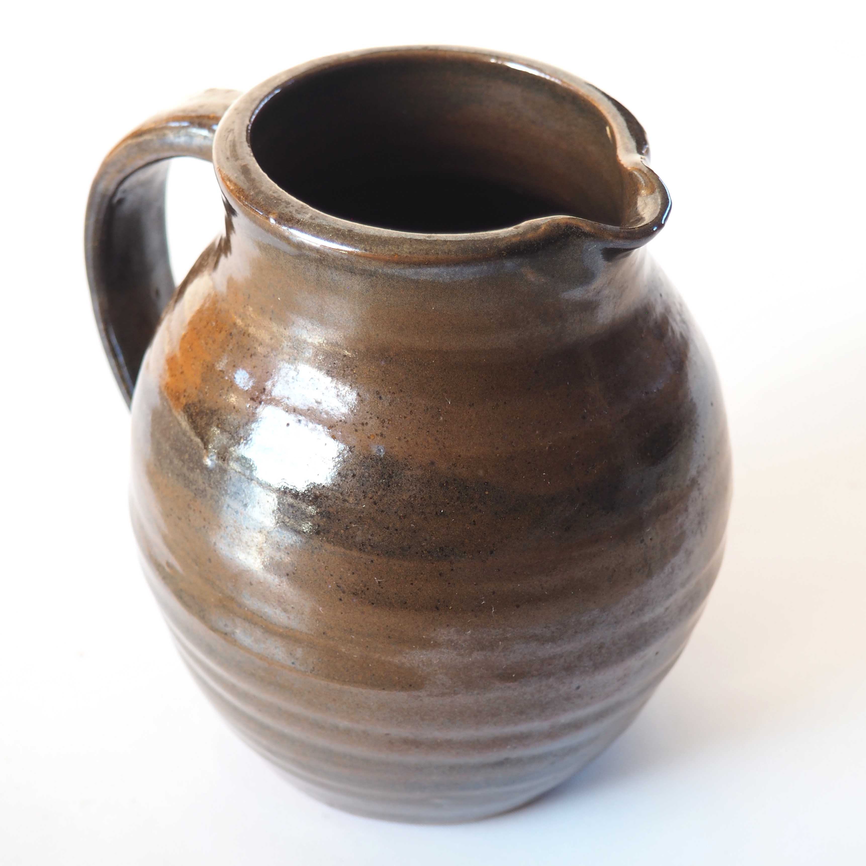 Duo of sandstone pitchers