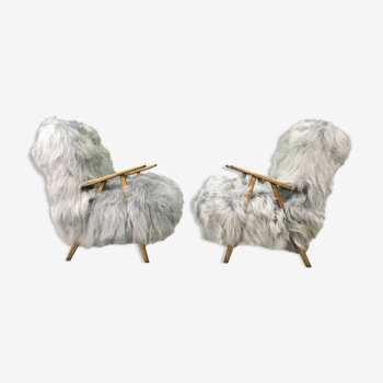 Paire de fauteuils en peau de mouton