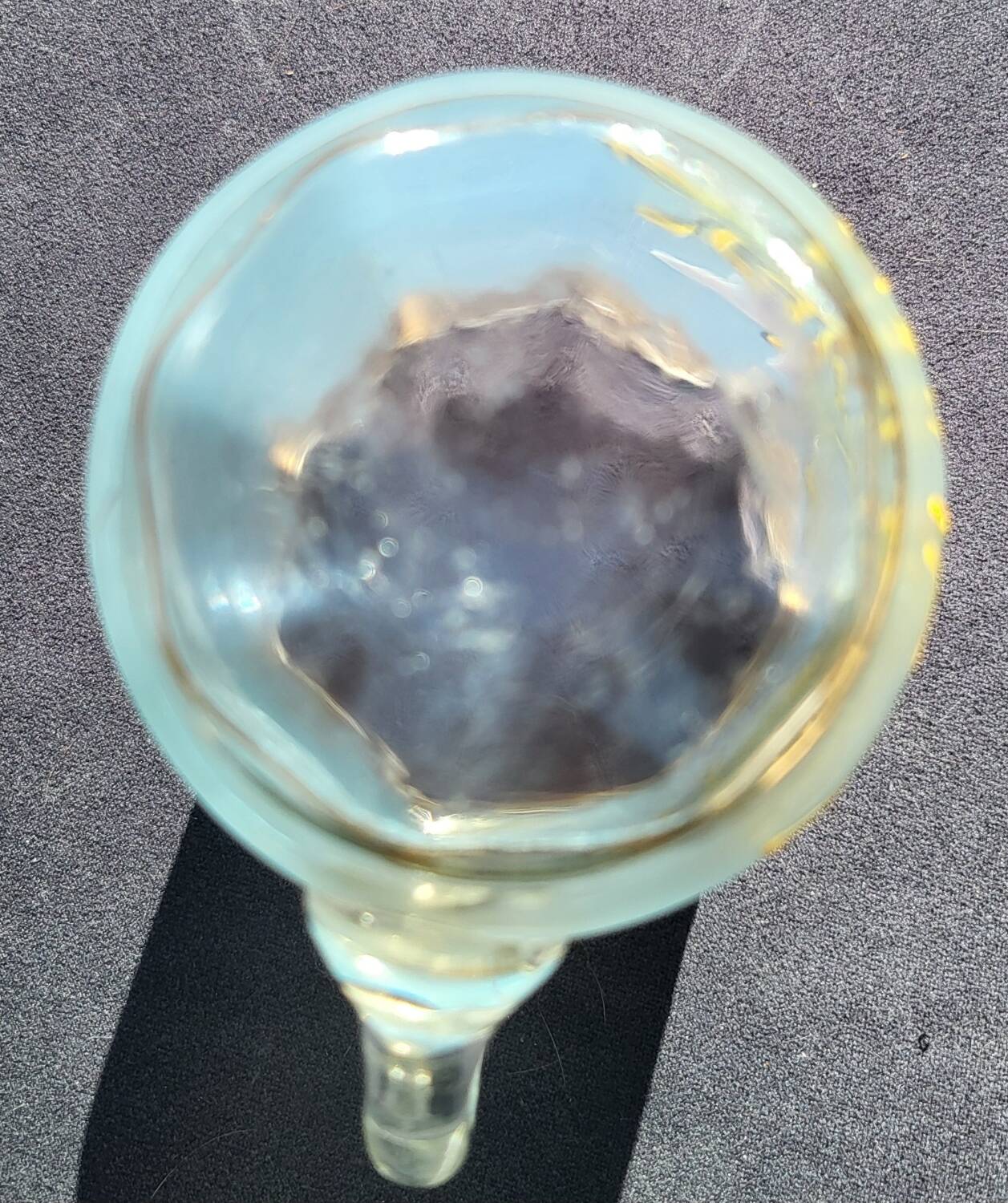 Old enameled blown glass cup