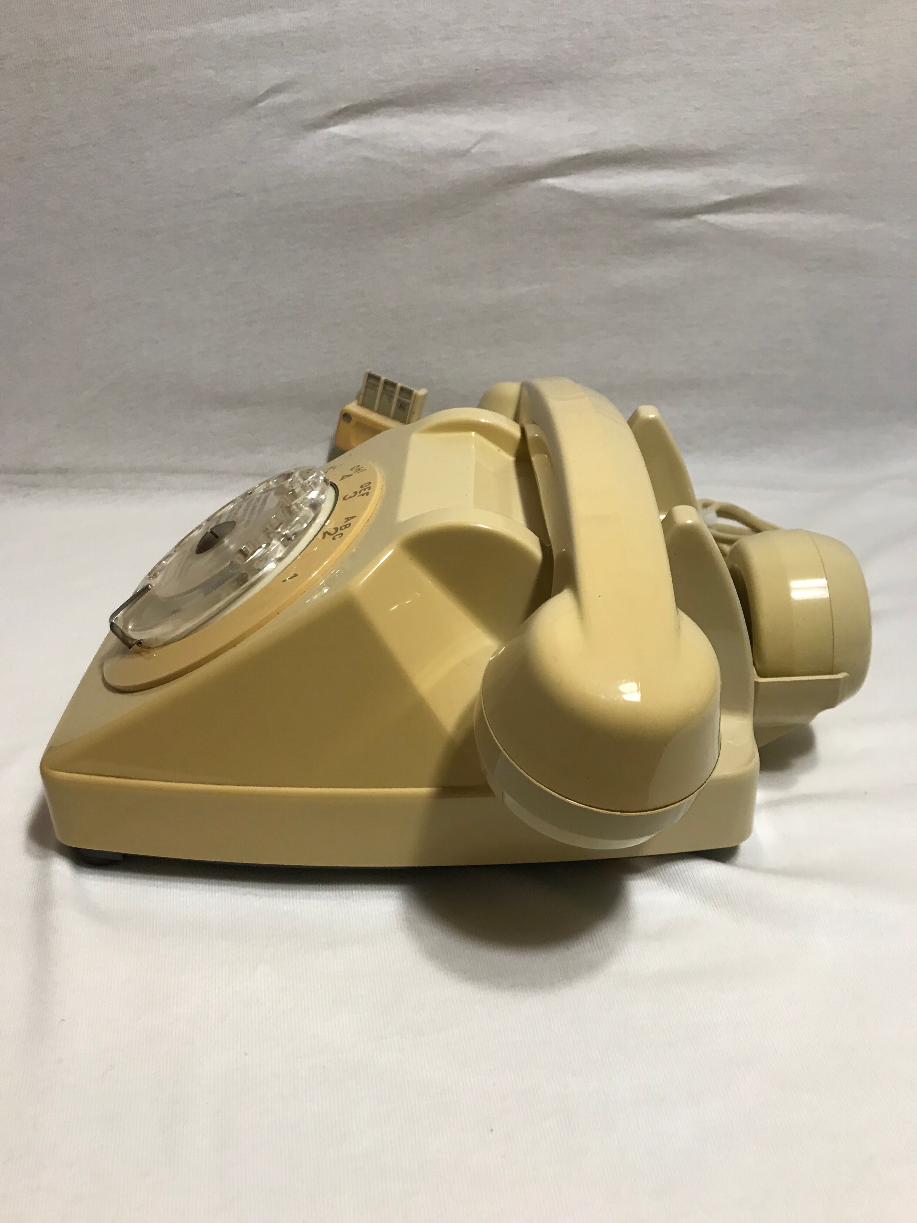 Old white dial phone beige dial, earphone, vintage velvet cover