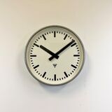 Grey industrial factory wall clock from pragotron, 1960s