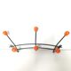 Black metal coat rack and orange wood balls