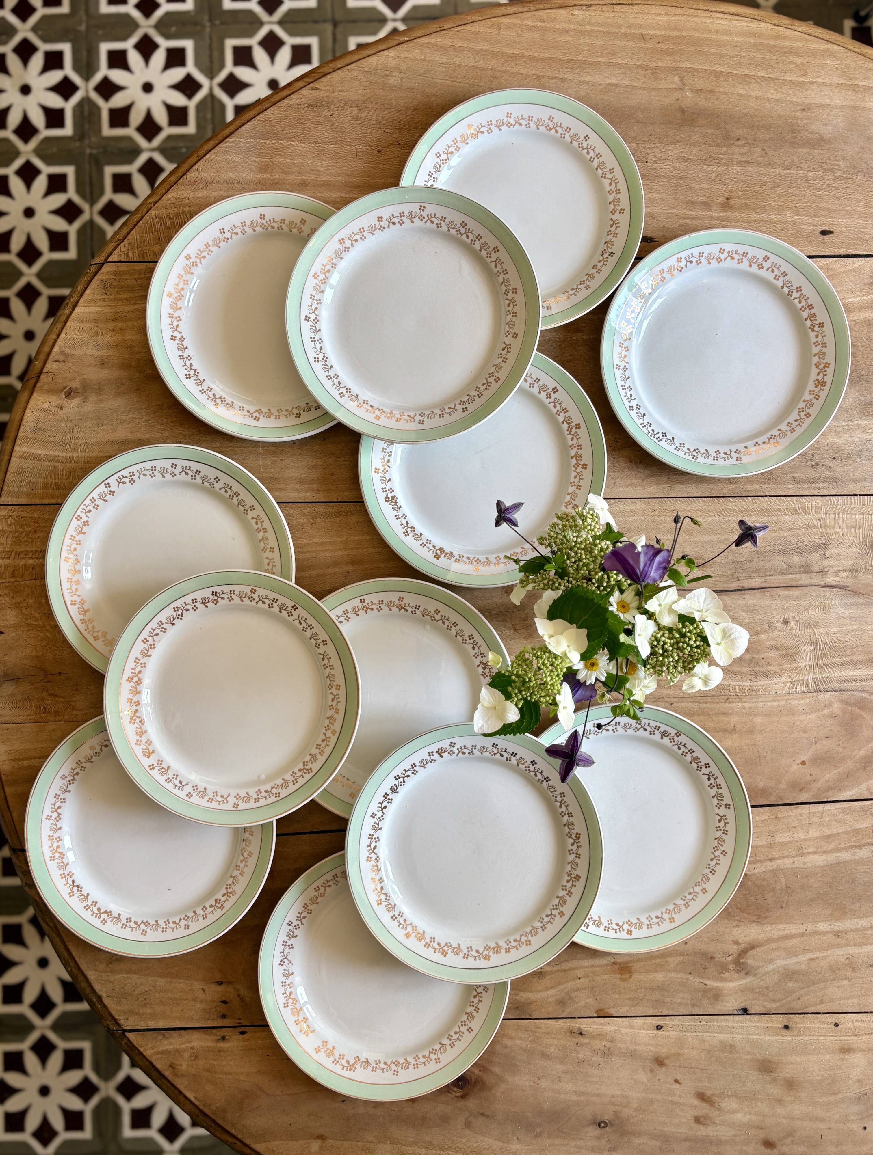 Set of 12 white, mint and gold flat plates, Mosèle de Lunéville