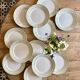 Set of 12 white, mint and gold flat plates, Mosèle de Lunéville