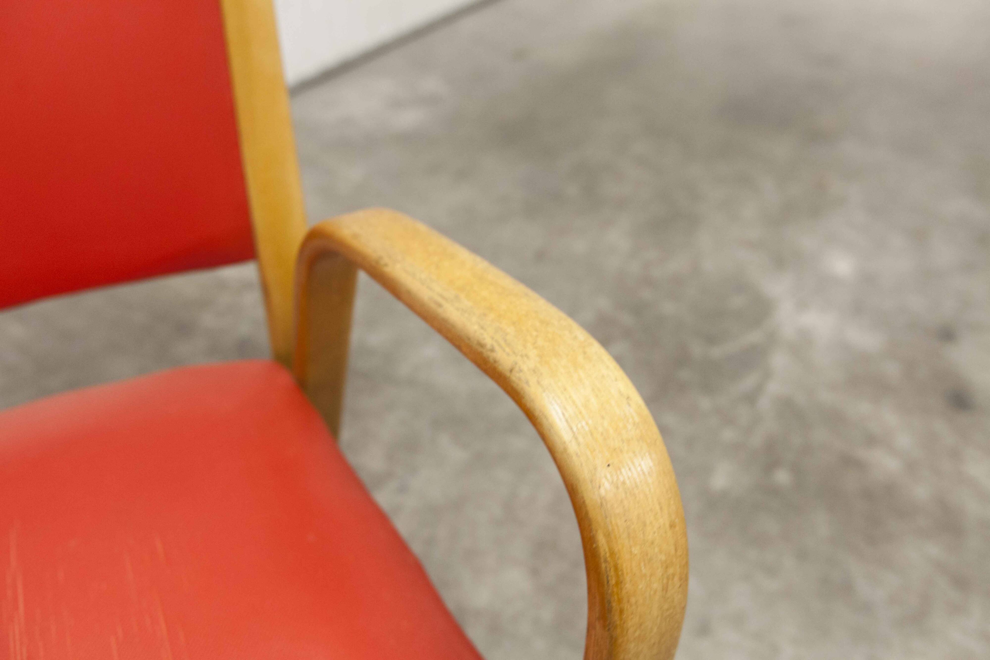 Bow wood armchair by Hugues Steiner 1960 red