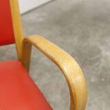 Bow wood armchair by Hugues Steiner 1960 red