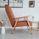 Scandinavian armchair with camel compass legs