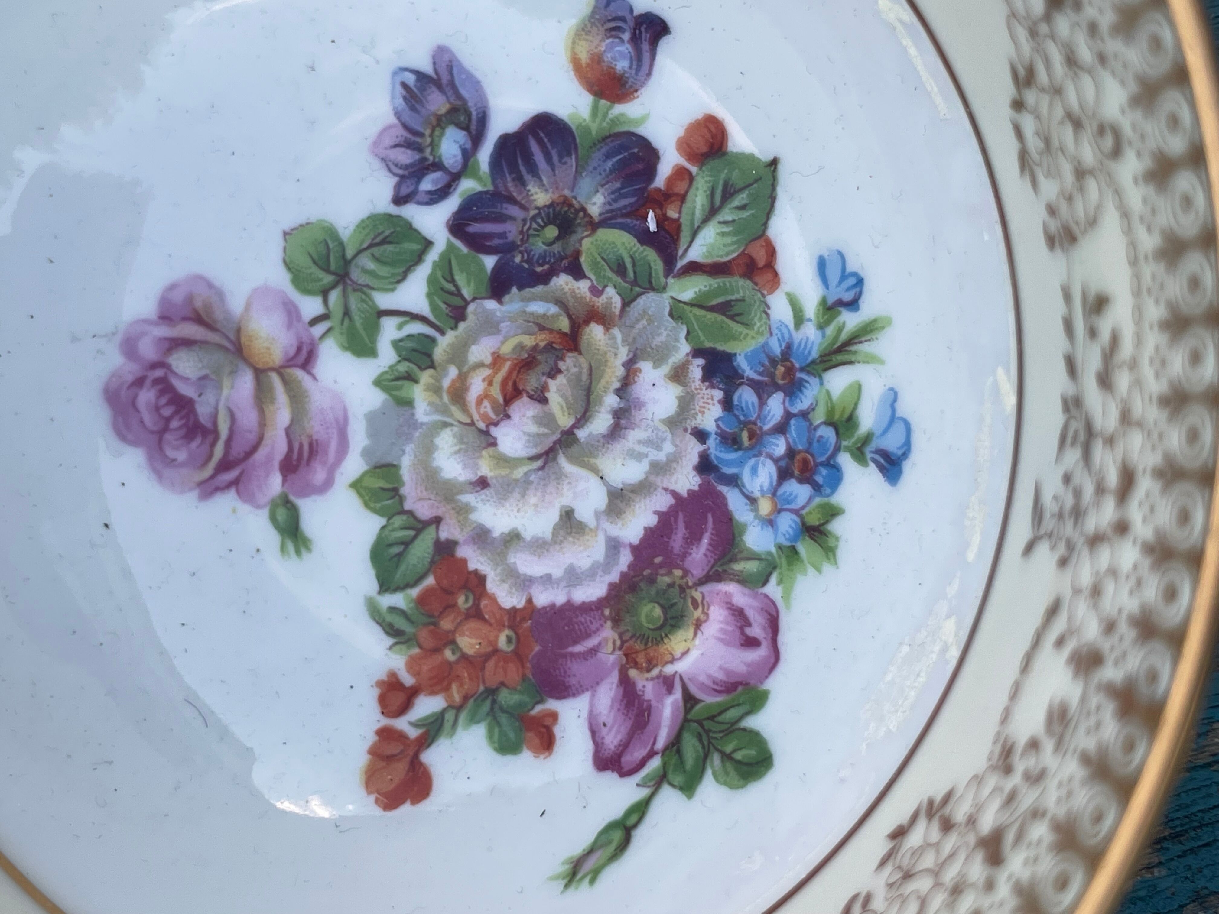 Limoges porcelain tea cup, signed