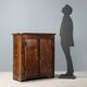 Antique pine wardrobe painted in walnut stain, restorations, Italy, 17th century.