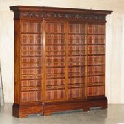 Monumental glass library in Victorian hardwood.