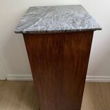 Vintage bedside table in the shape of a wooden column and a gray marble top