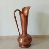 Old italian amphora vase in hammered copper