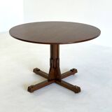 Wooden round dining table from ISA Bergamo with unique base