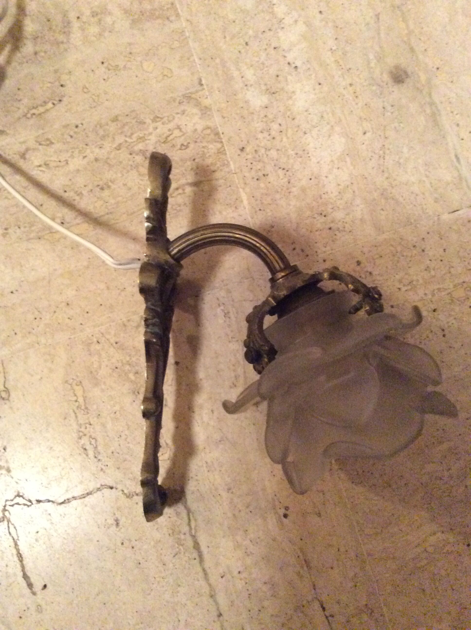 Old wall lamp in bronze and glass
