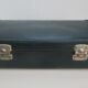 Vintage green cardboard suitcase