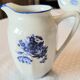 Blue and white ceramic coffee service with vintage flowers.