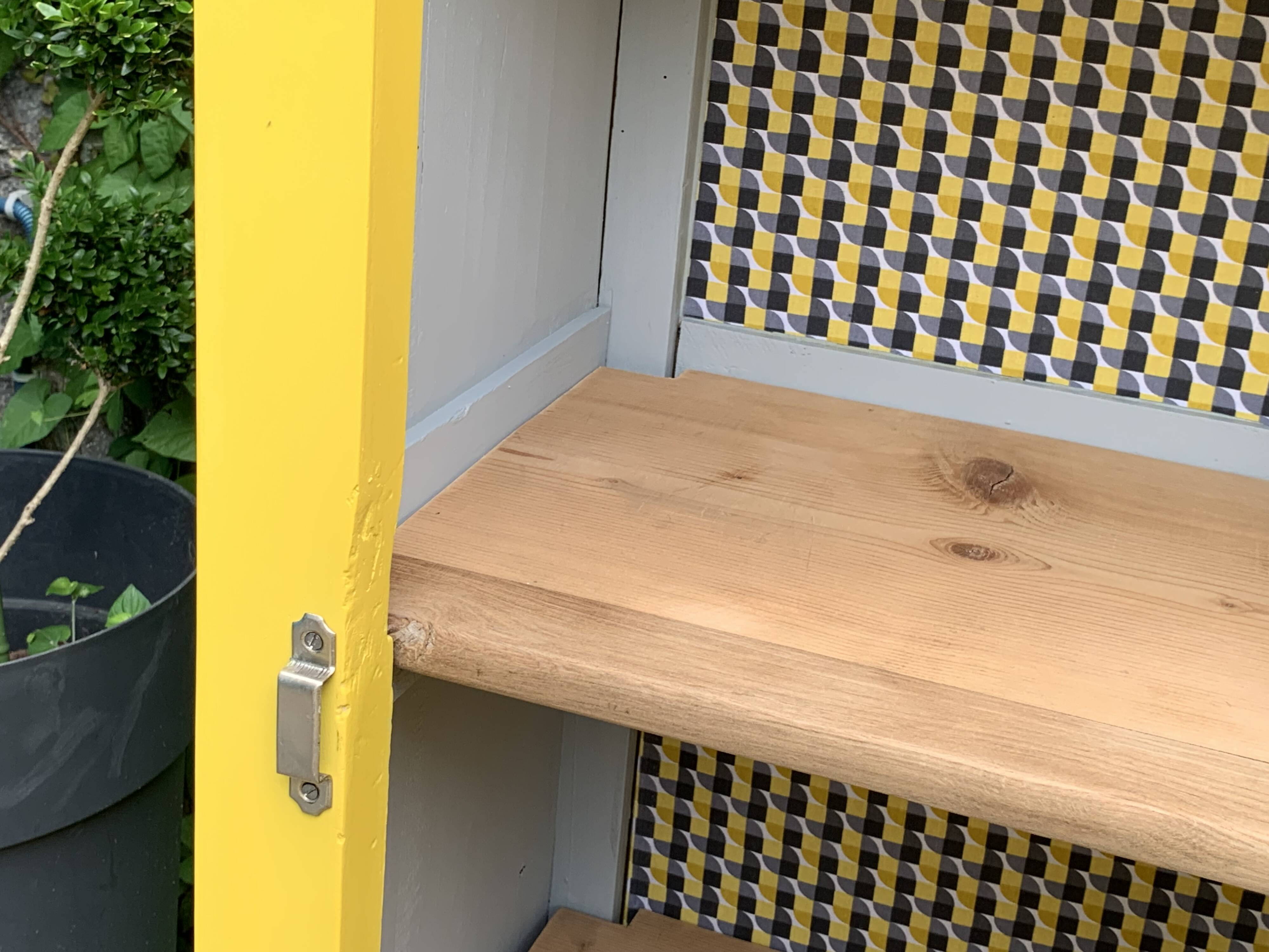 Antique powder yellow Parisian bonnetière wardrobe.