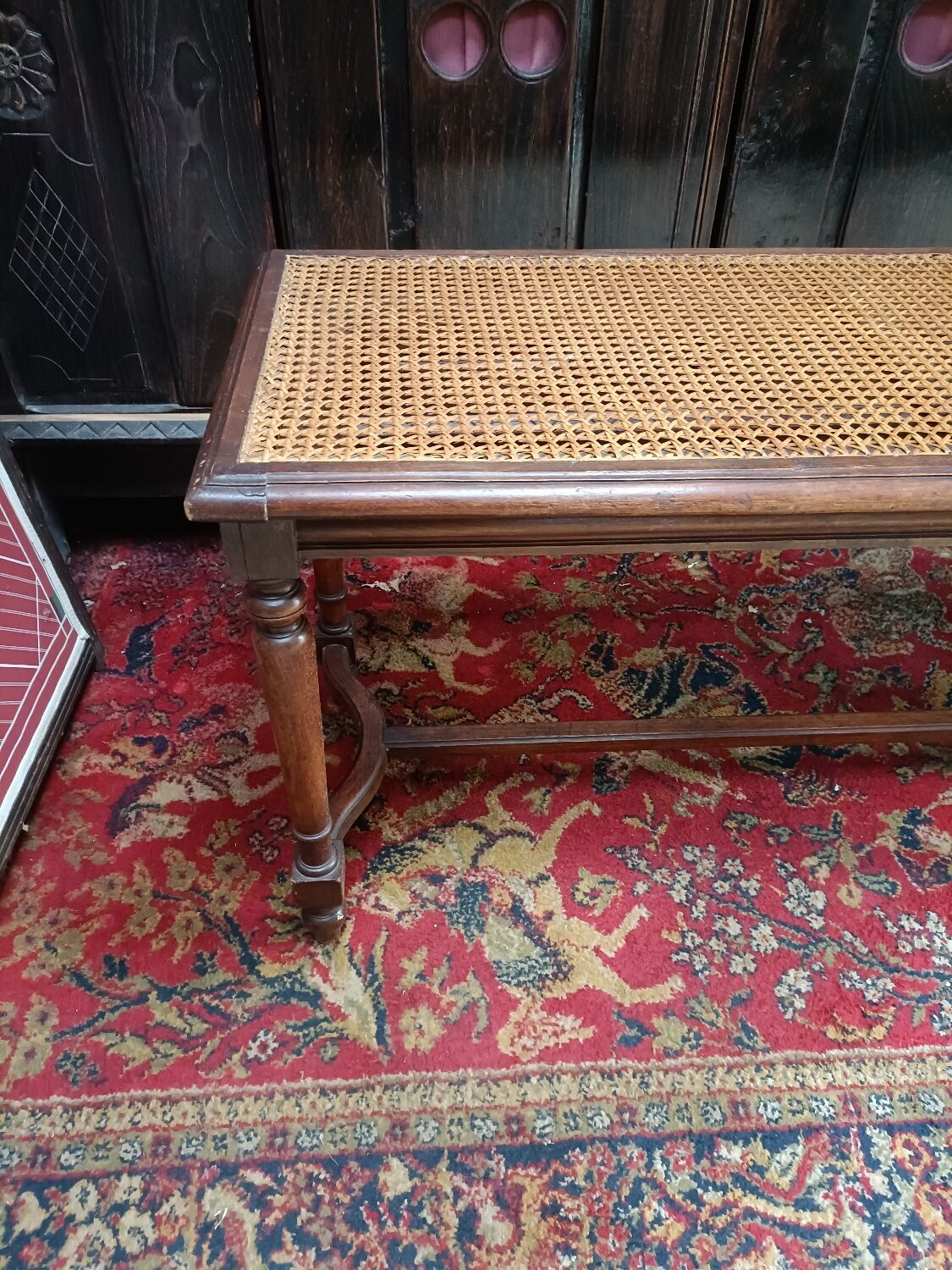 Wooden bench or piano bench with tanned seat