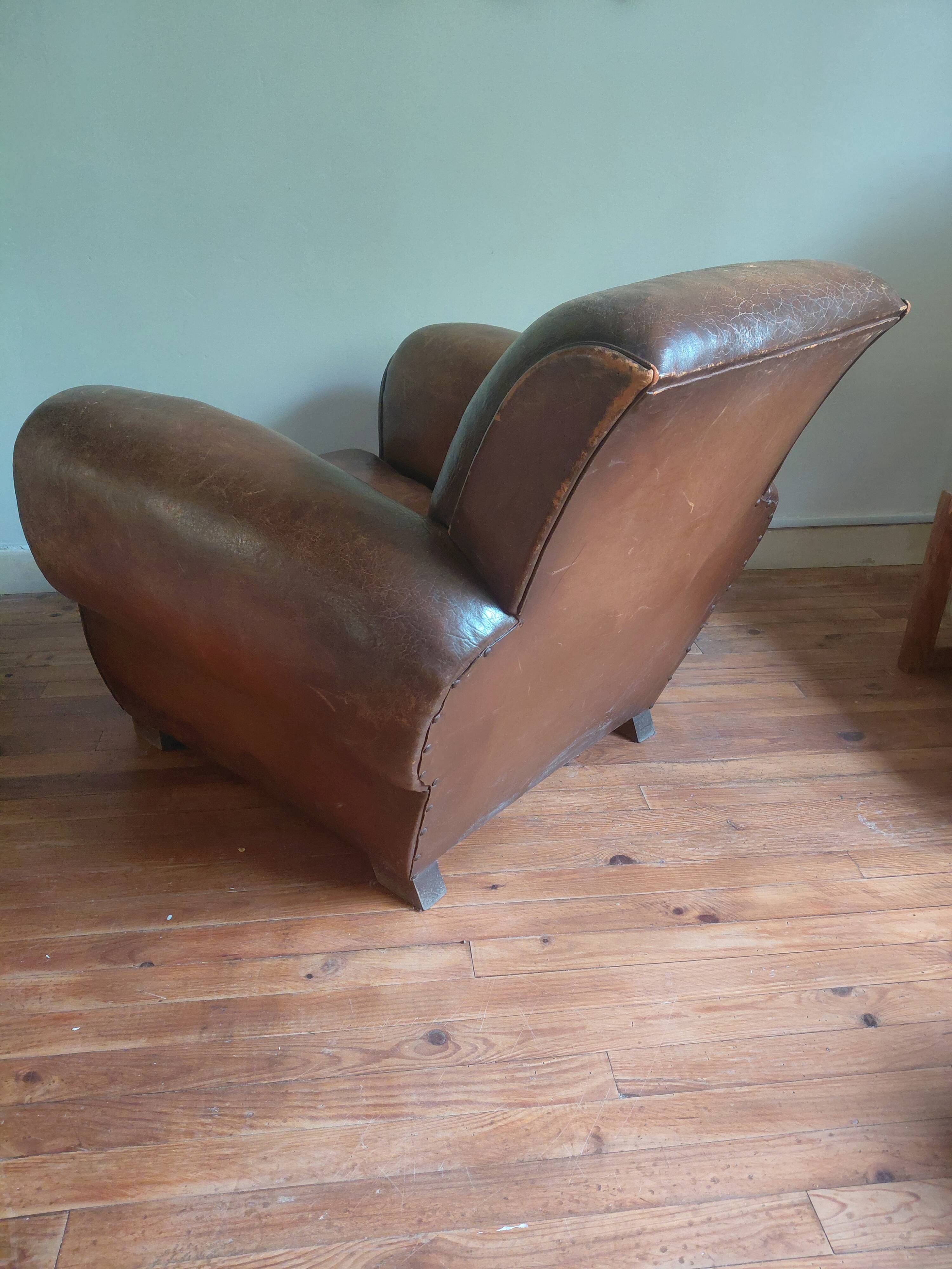 Club armchair, patinated leather
