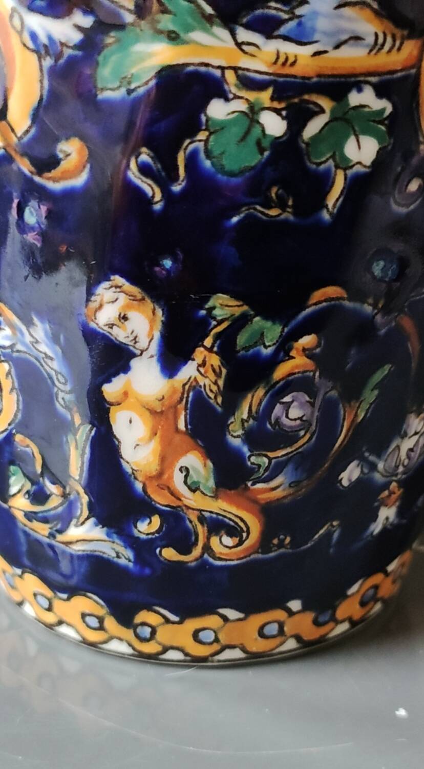 Twisted design vase. Signed Gien France/Renaissance blue background 26 x 13cm