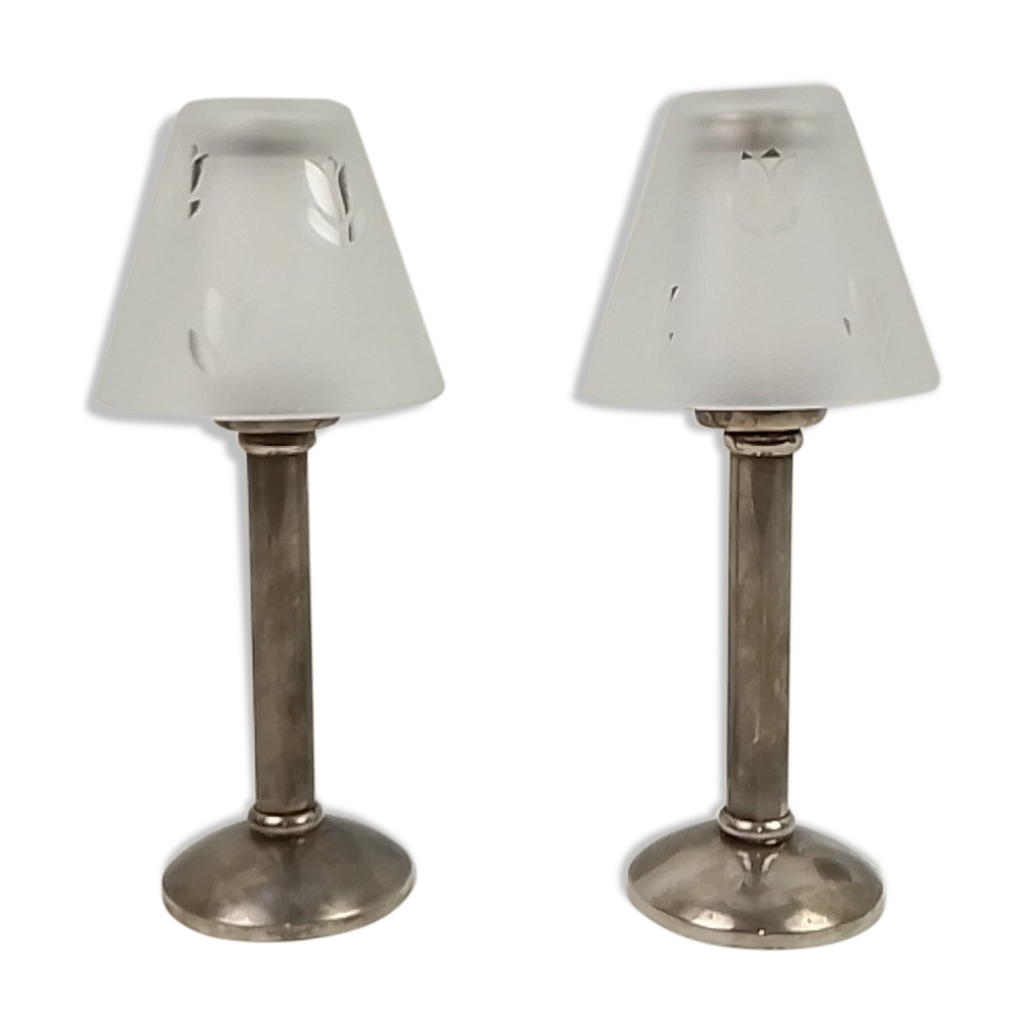 Pair of metal candlesticks with glass lampshade