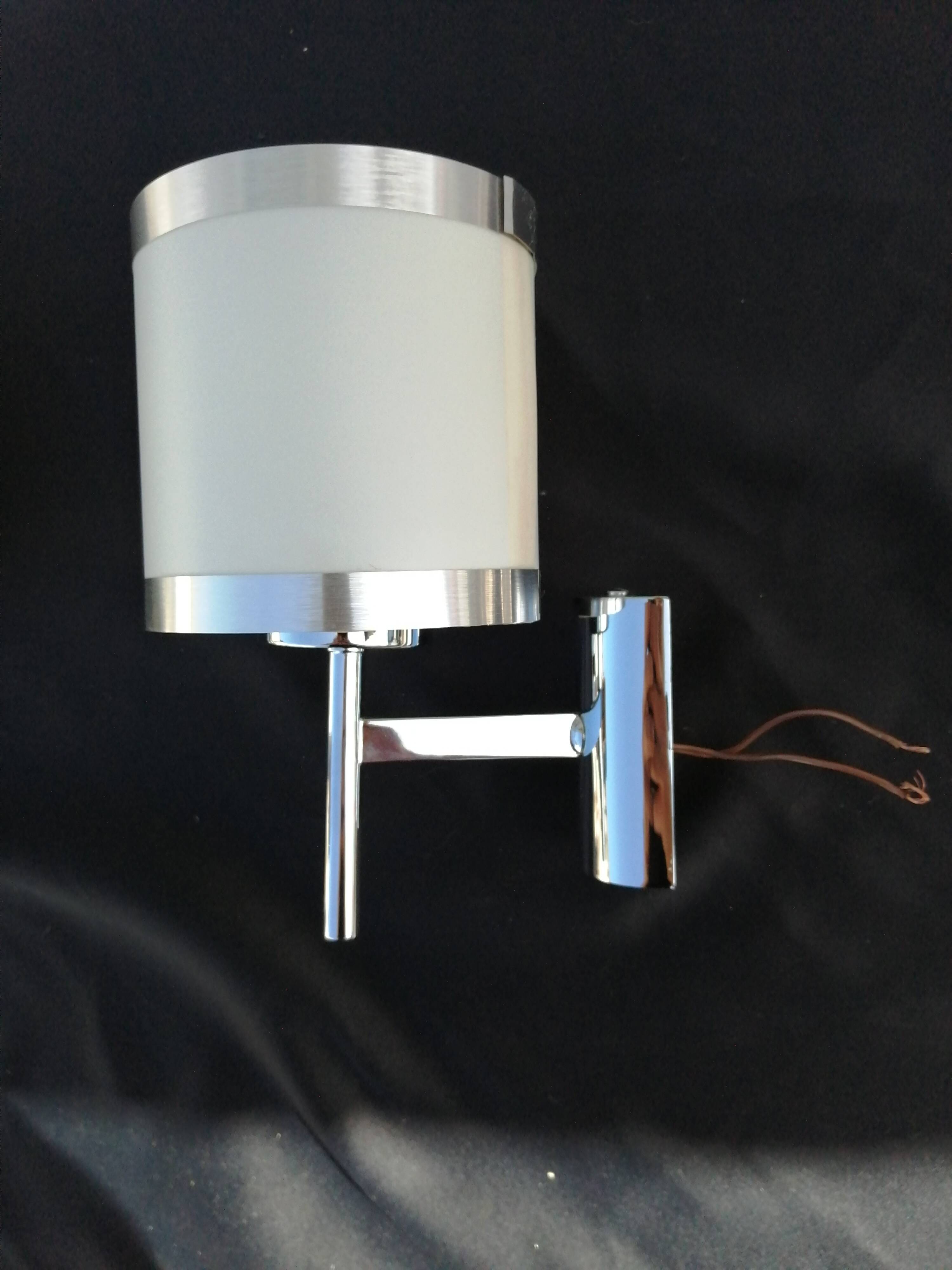 Pair of chrome design wall lights and vintage white hat 1970