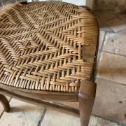 Campaign stool in rattan and wood
