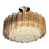 Chandelier with glass trunks in Murano crystal and smoky glass.