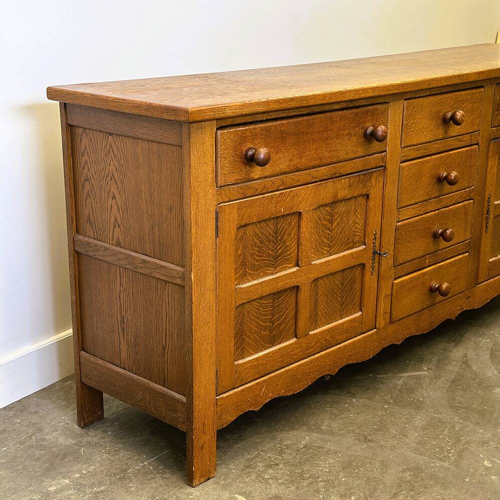 Vintage french oak sideboard with wavy details, ca. 1950s