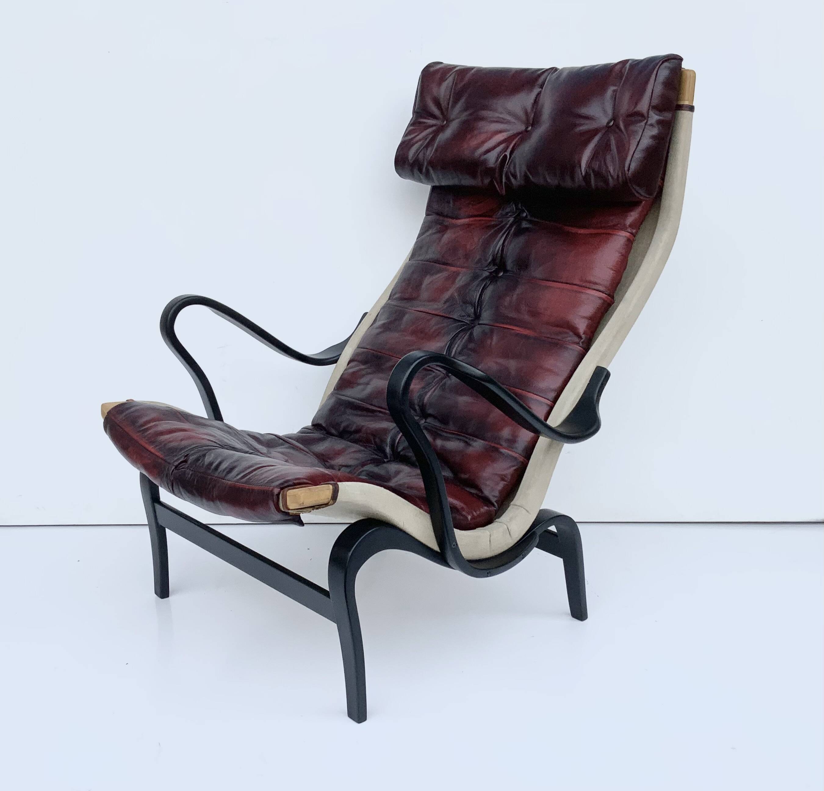 Vintage Pernilla 69 Armchair by Bruno Mathsson for Dux In Oxblood Leather