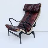 Fauteuil vintage Pernilla 69 de Bruno Mathsson pour Dux en cuir sang de bœuf