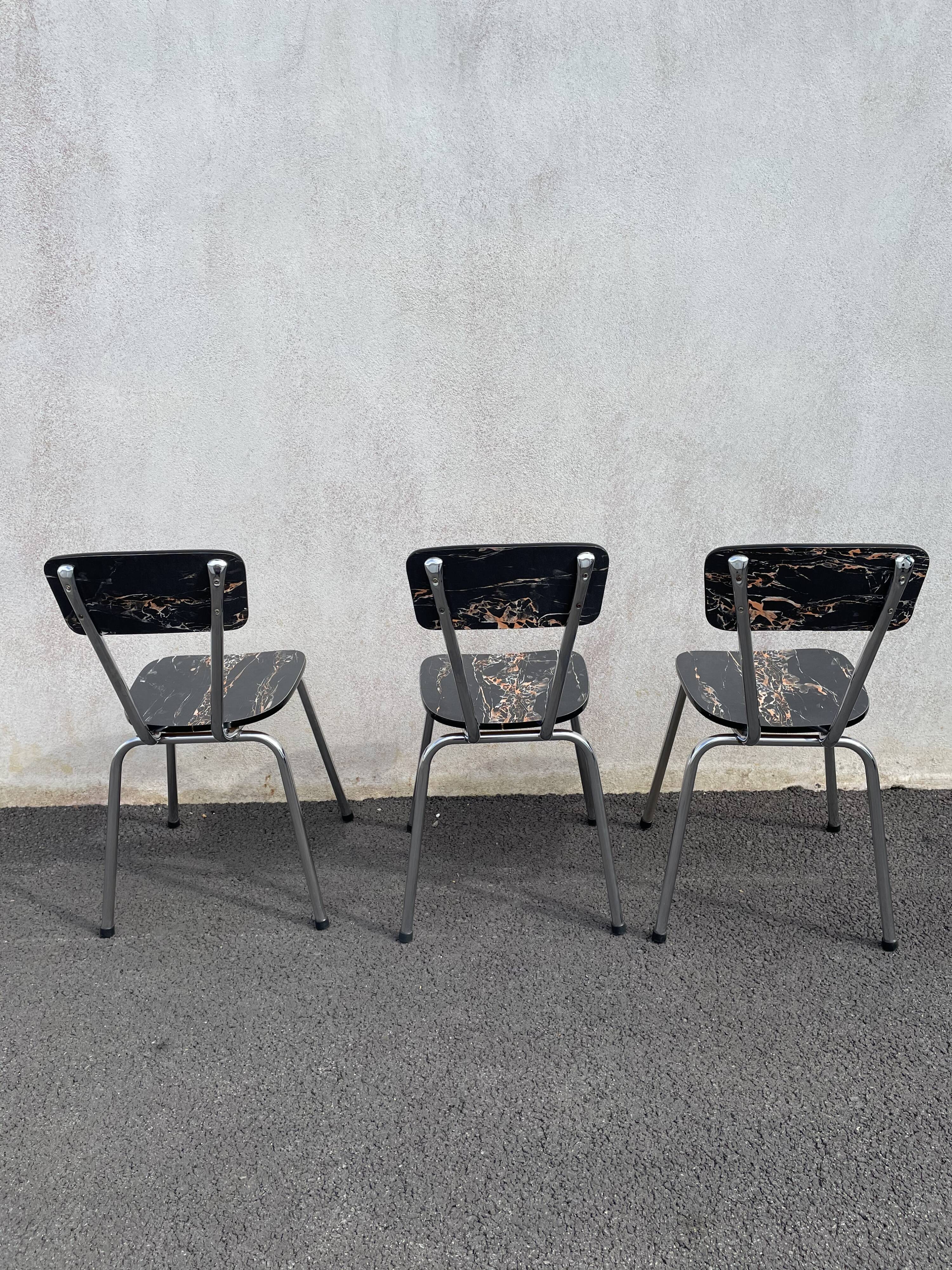Black marbled formica chairs