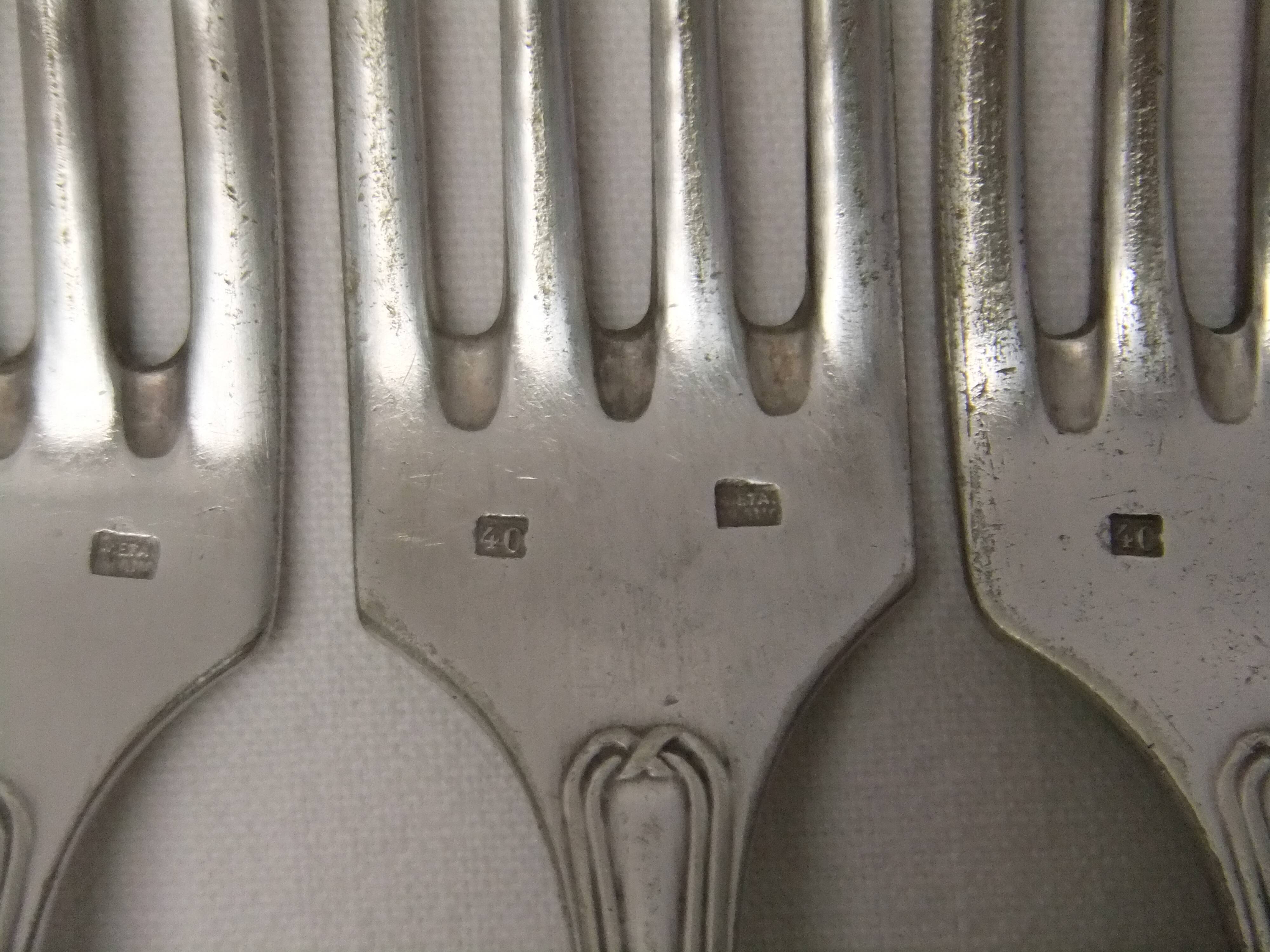 Old Louis XVI service fork with mesh ribbon