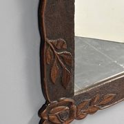 Arts & Crafts hand-carved wall mirror with floral roses, early 20th century