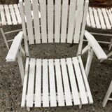 Five wooden garden armchairs