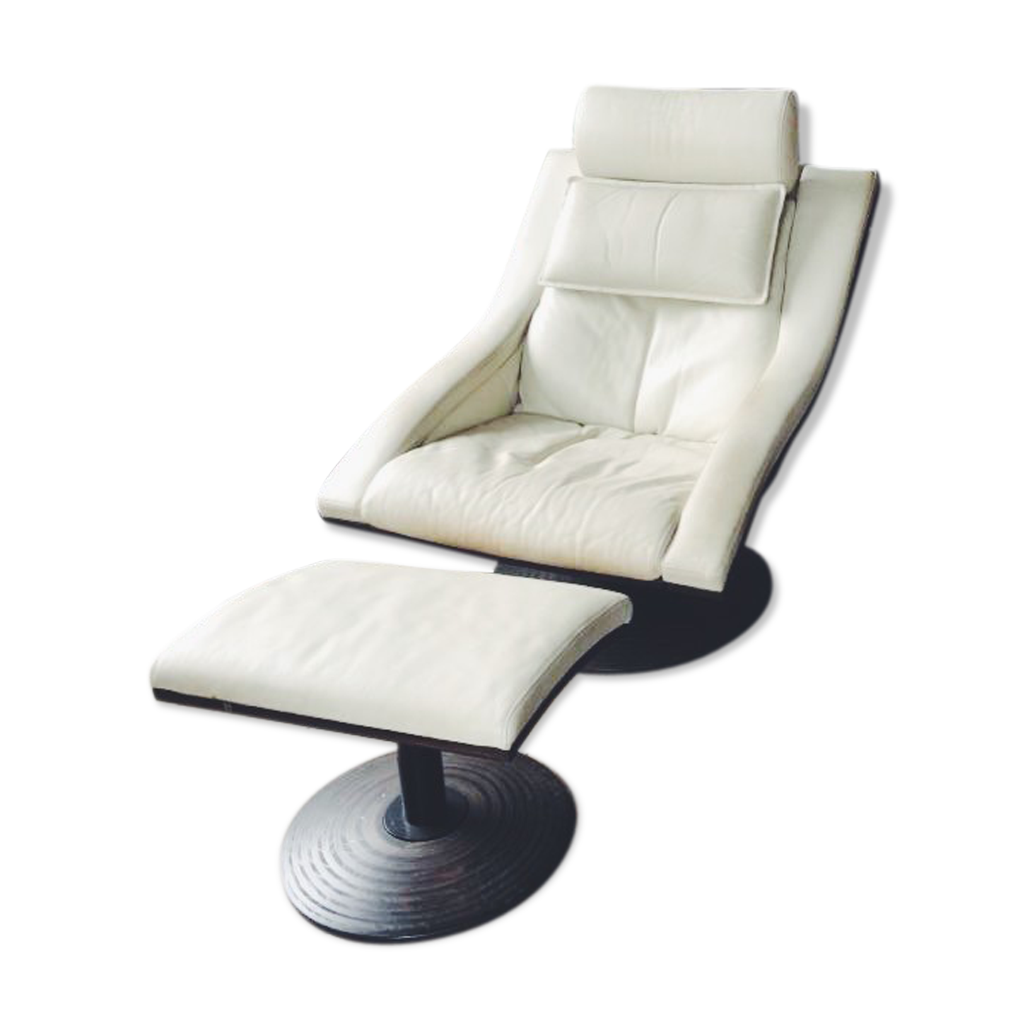 White leather armchair and ottoman